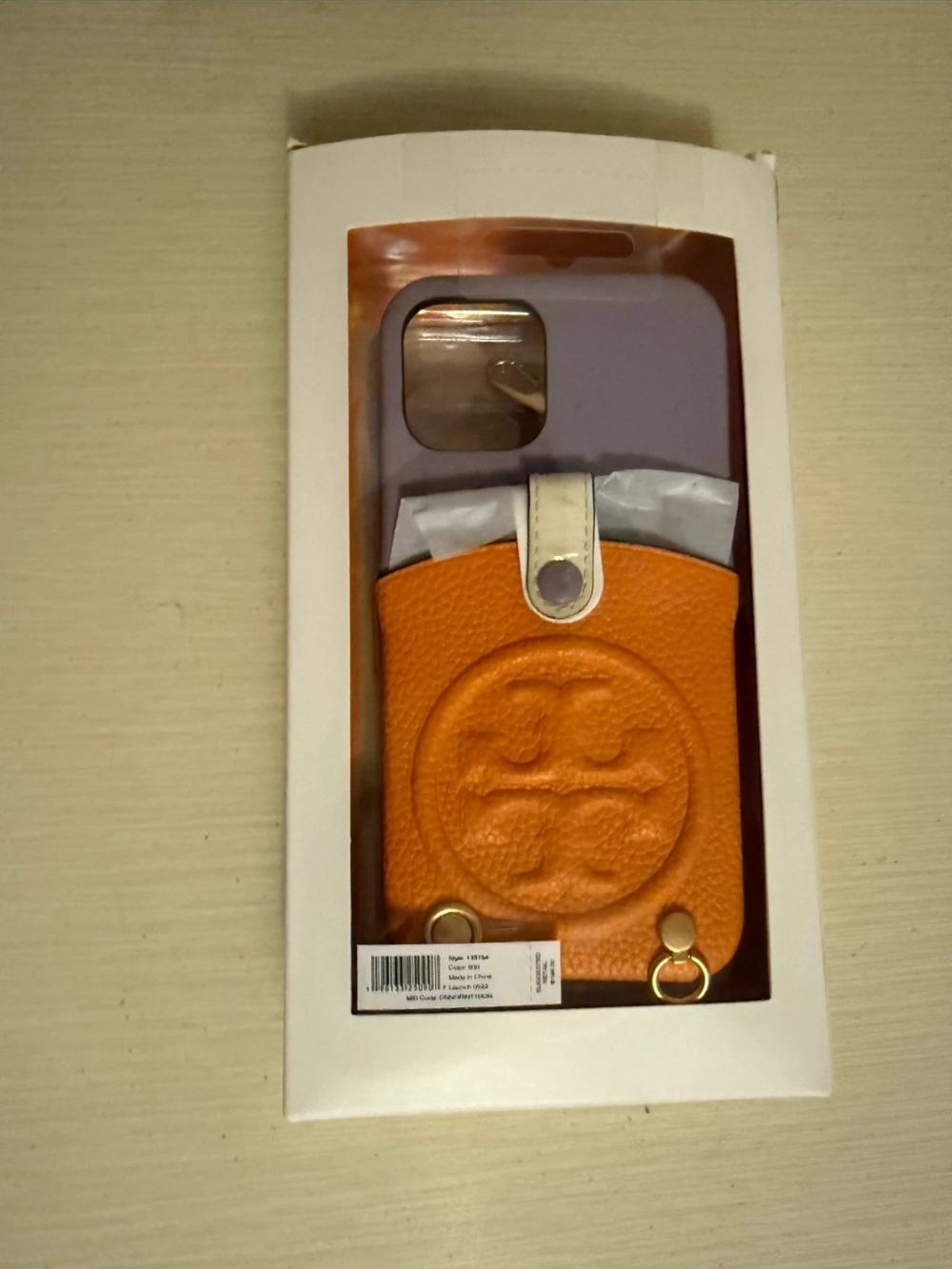 Iphone 15. Tory Burch Orange Leather Snap Card Pocket Phone Case with Lilac Back